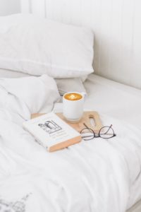 Self-Love reading in bed