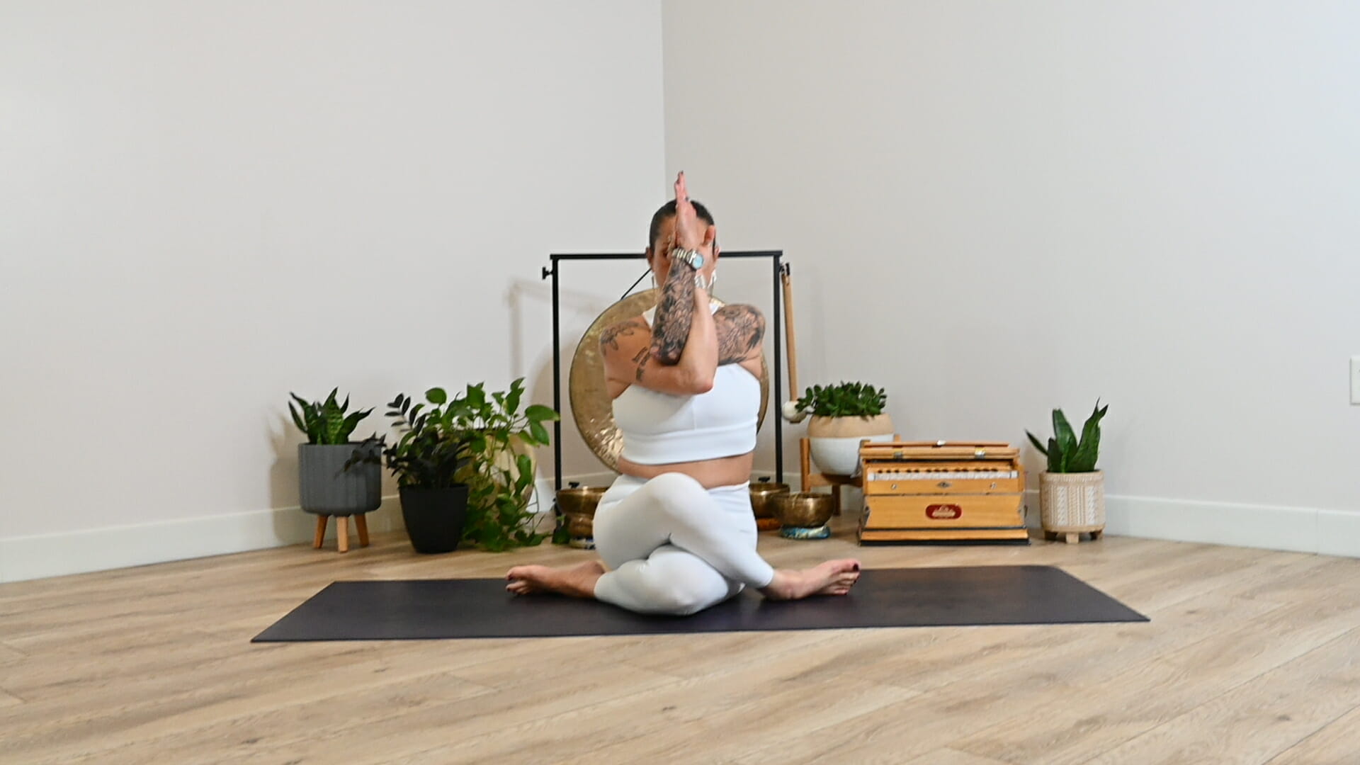 Michelle Young in seated eagle pose
