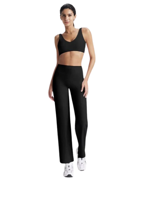 Black scoop neck yoga bra and high waist flair yoga pant